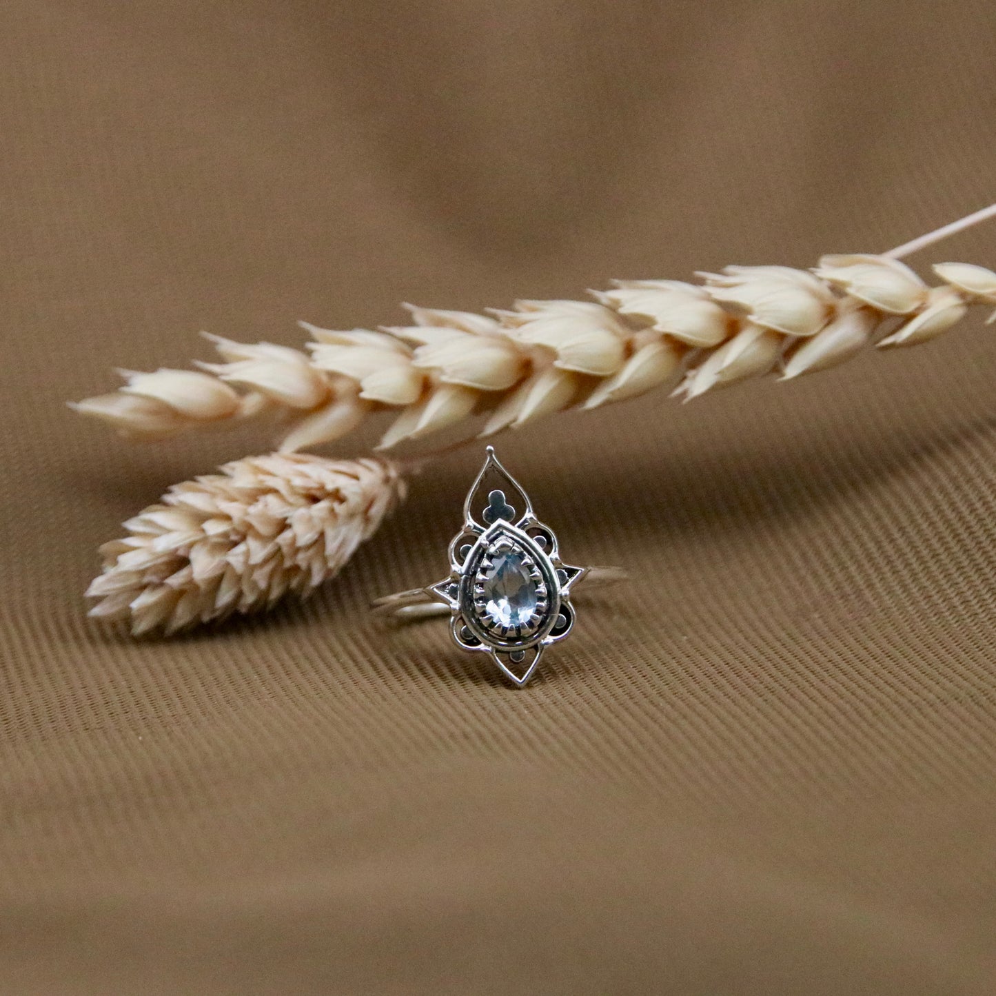 Sterling Silver Delicate Silhouette Ring Blue Topaz