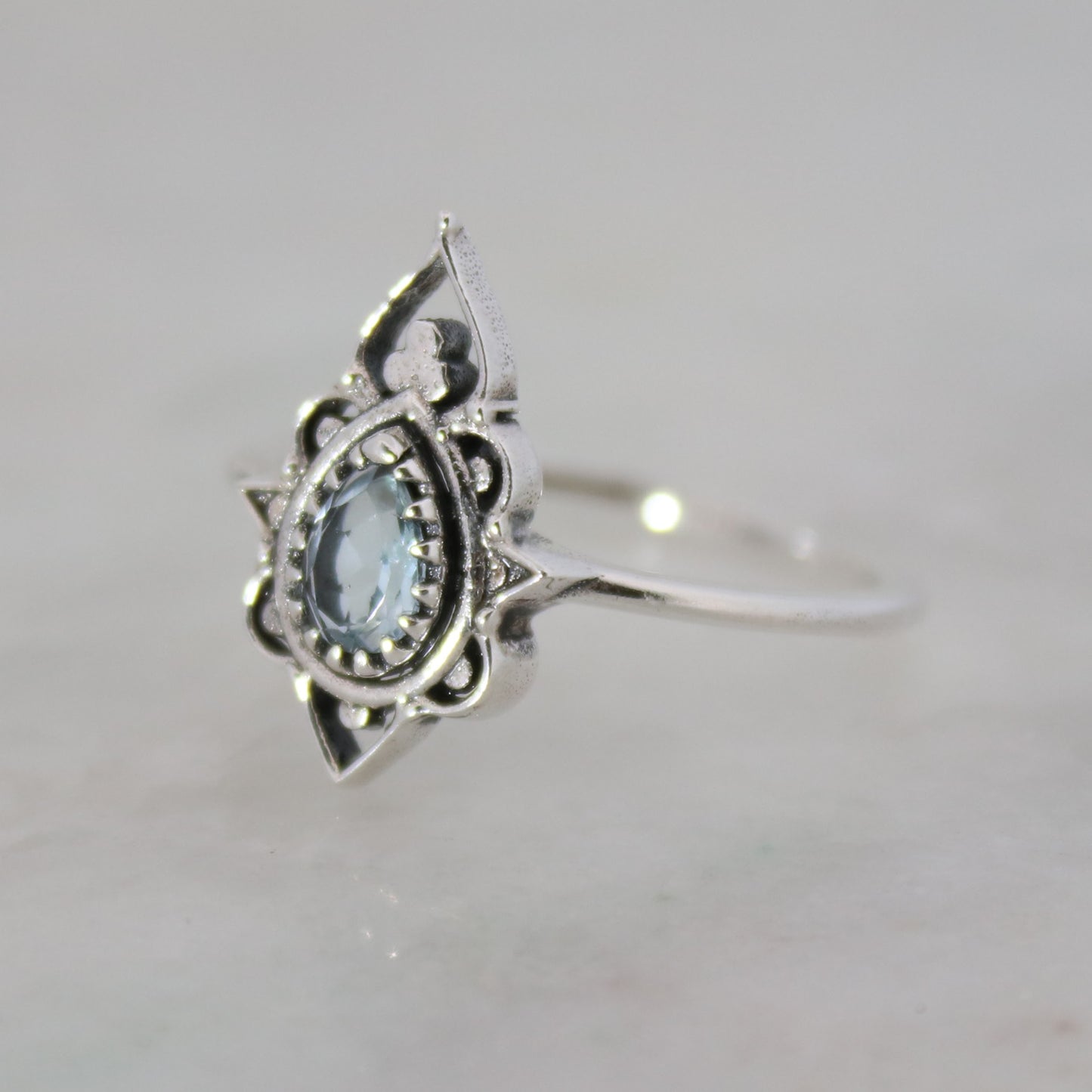 Sterling Silver Delicate Silhouette Ring Blue Topaz